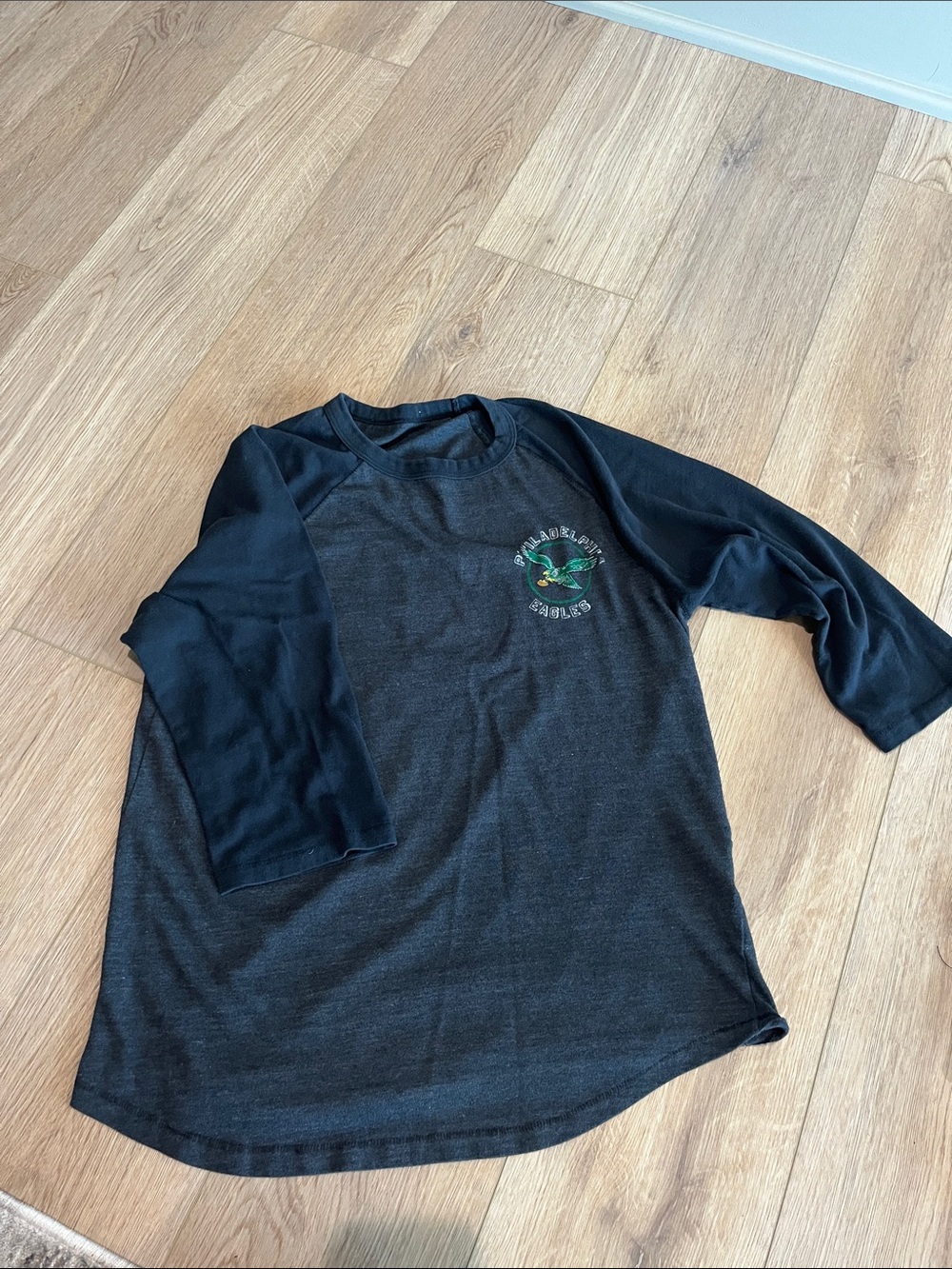 Philadelphia Eagles Black Raglan 3/4 Sleeve Graphic Tee with Green Logo
